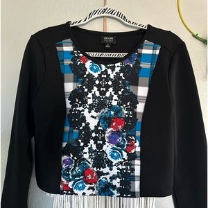 Nicole Miller blue, purple, black and white crop style women’s long sleeve top